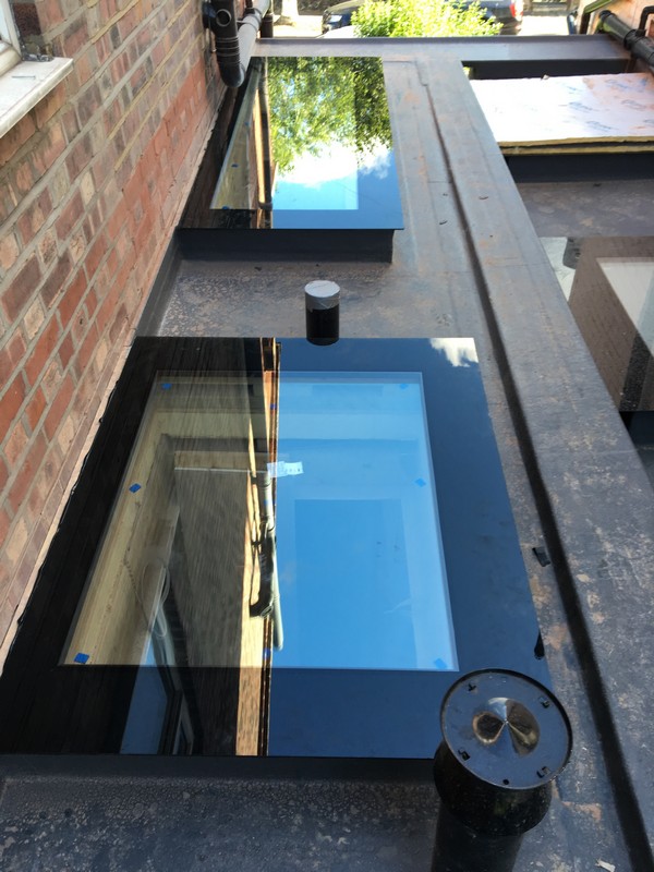 Multiple flat roof skylights on extension in Wallington